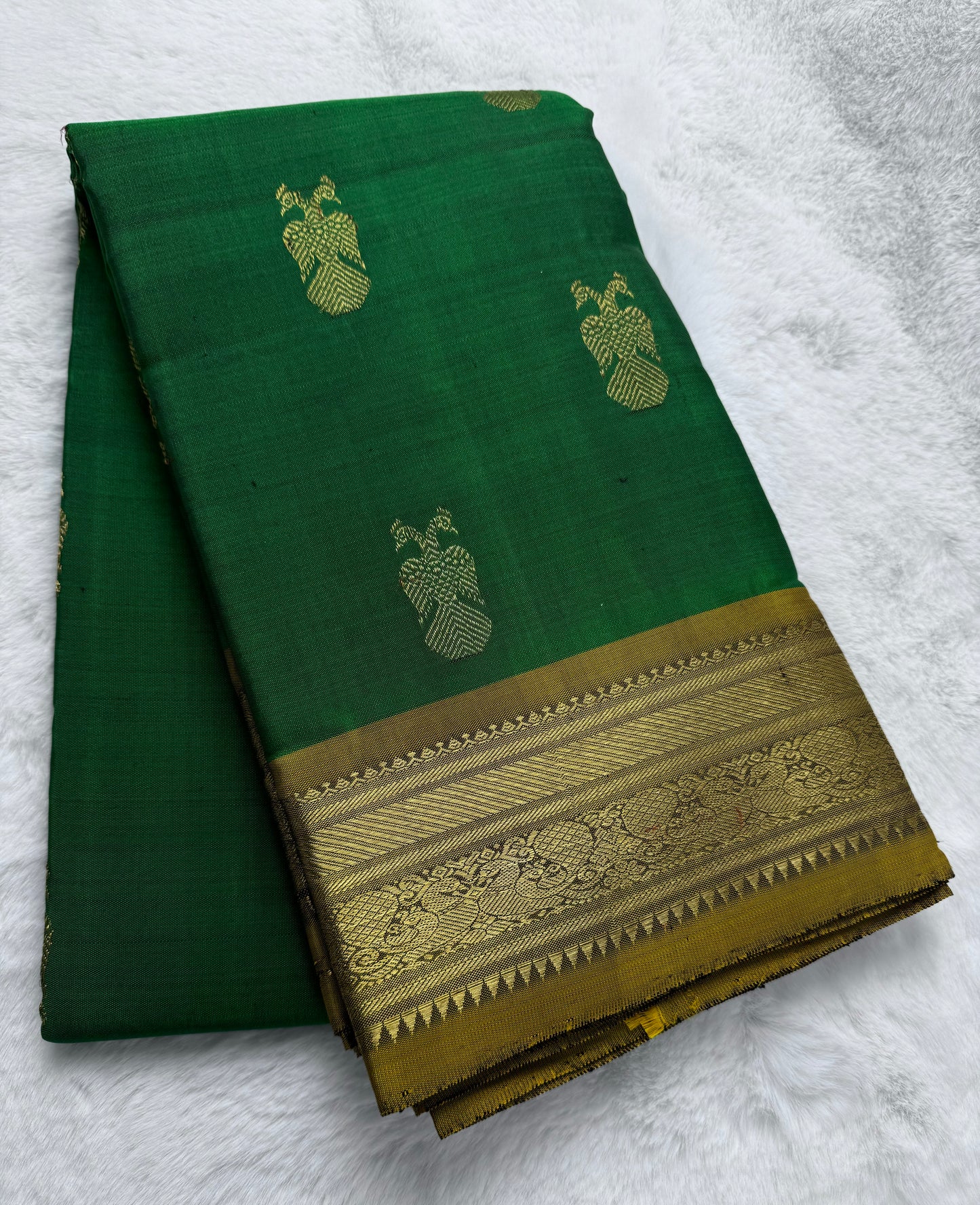 Green with garuda butta border Kanchipuram pure zari silk saree